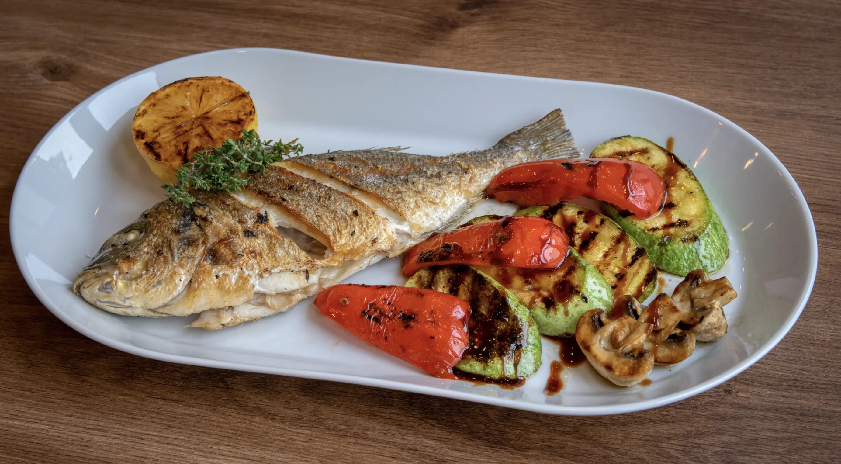 Grilled fish with roasted vegetables